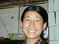 A Tibetan woman in a restaurant in Barkham.